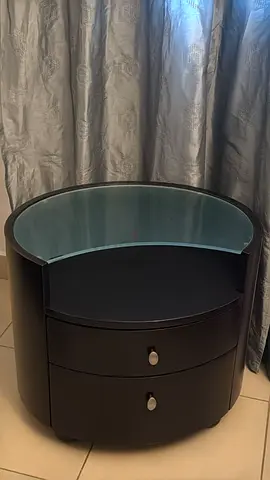 My black round bedside table with glass top and 2 drawers - Home Center (2 are availabe)