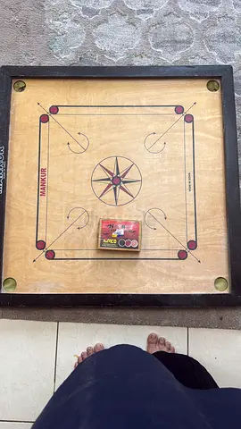 Used wooden carrom board with coins and striker size 32