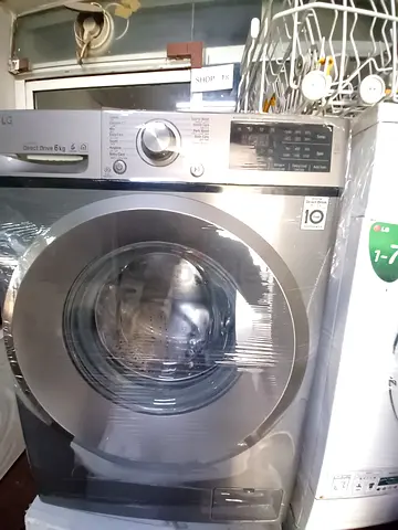 Silver front-load washing machine - good working condition
