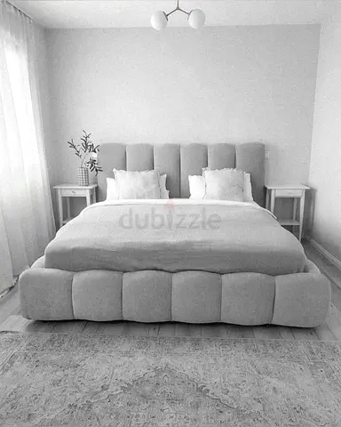 My upholstered queen bed frame with padded headboard