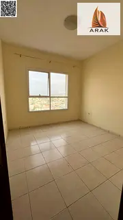 Two bedroom apartment for annual rent in Garden City Towers Al Hamidiya 1 with central AC balcony an