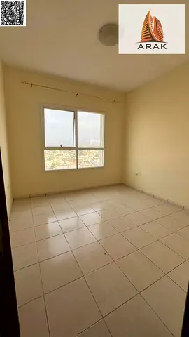Two bedroom apartment for annual rent in Garden City Towers Al Hamidiya 1 with central AC balcony and two bathrooms in a prime location