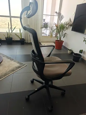 Ergonomic swivel office chair with headrest - used