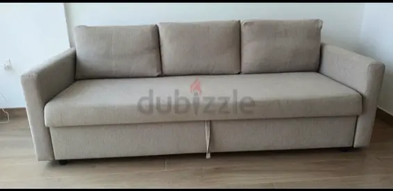My beige 3-seater fabric Sofa bed with under-seat storage