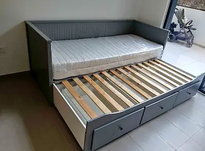 IKEA Hamnes Day bed with 3 storage drawers underneath and with 2 IKEA mattresses is available in exc