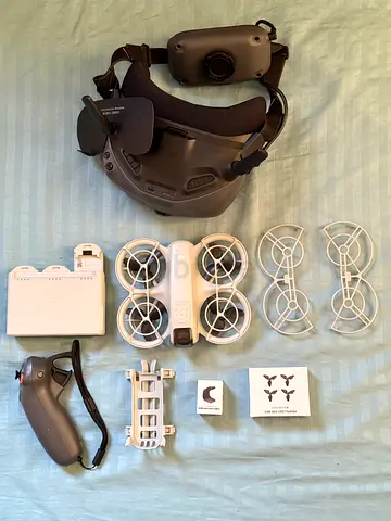 DJI Neo FPV Full Combo – Goggles + Motion Controller – Like New with package spare  safety parts