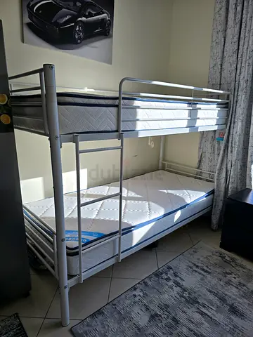 Metal bunk bed (includes two mattresses)