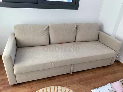 Beige 3-seater sofa bed, as barnd condition
