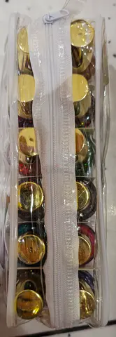 Assorted cosmetic pigment/glitter pots in clear zip pouch