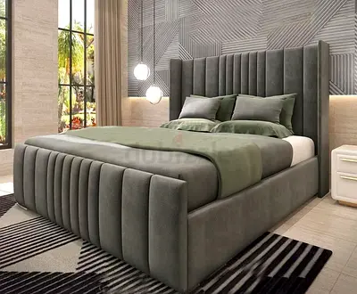 My grey upholstered king bed with Manual storage — good condition