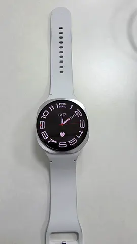 My round samsung smartwatch 8 — silver case, white silicone strap