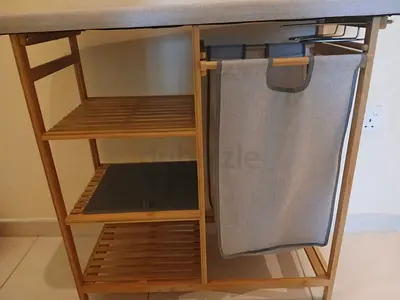 Bamboo iron board and storage unit with laundry hamper