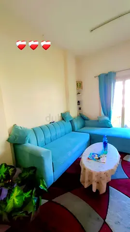 Turquoise L-shaped sectional sofa with chaise (well maintained)