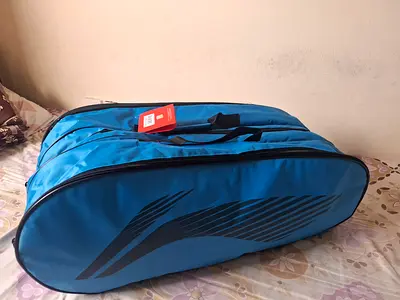 Blue badminton racket bag - three compartments, good condition