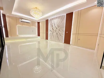 A villa with all-inclusive price (electricity, water, and air conditioning) on ​​the main street, ready to move in, in one of Ajman's most prestigious