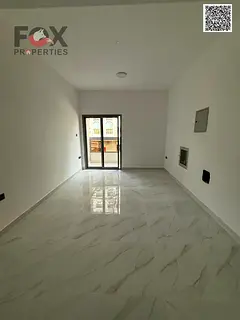 One bedroom and living room for annual rent in Ajman, Al Karama area, near Ajman Corniche