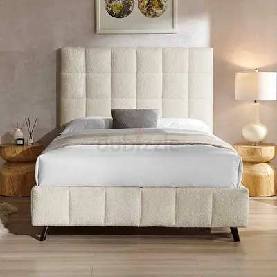king Size cream bouclé upholstered double bed with tall tufted headboard
