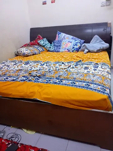 My used wooden double bed with side table with mattress - good condition