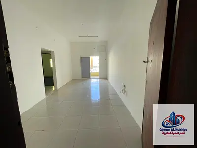 The most beautiful and elegant one-bedroom apartment with a living room in Al Butina, featuring 2 balconies with an open city view .