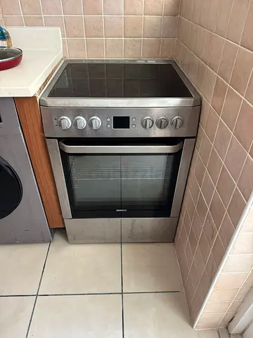 Stainless steel electric range with ceramic hob and oven - working condition