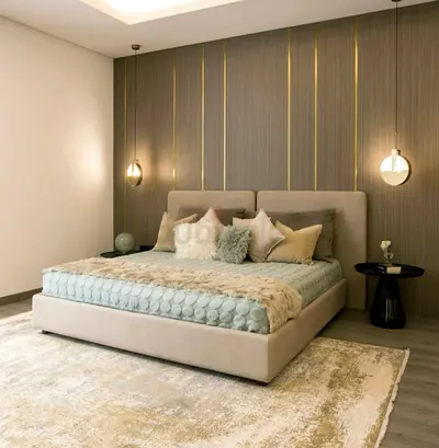 Beige upholstered platform bed with padded headboard