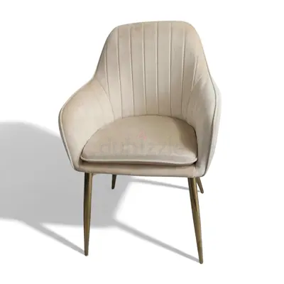 Beige velvet accent chair with gold legs