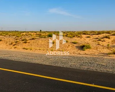أرض تجارية واستثمارية للبيع بالبليدة 2 – موقع استراتيجي على شارع مليحة مباشرة، الشارقة