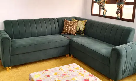 L-shaped green upholstered corner sofa - used, good condition