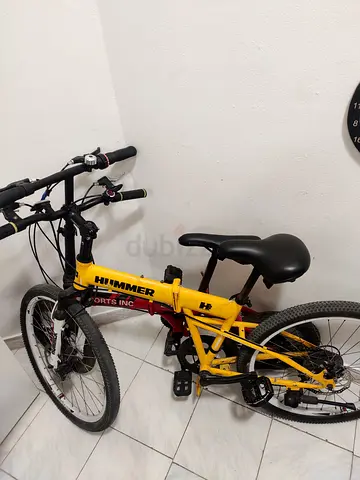 My yellow Hummer folding bike and sports.inc - used, good condition
