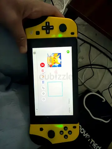 Nintendo Switch with yellow Joy‑Con grips (working)