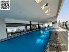 Luxury 1BR apartment in Rashidiya 1 with gym, pool &amp; aqua park, master room, built-in wardrobes,