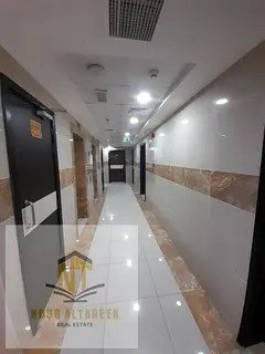 Apartment for annual rent in Al Taawun area Sheikha Laila Tower Two bedrooms and a living room with