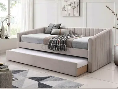 Grey upholstered daybed with pull-out trundle