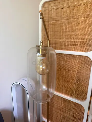 Brass floor lamp with glass cylinder shade