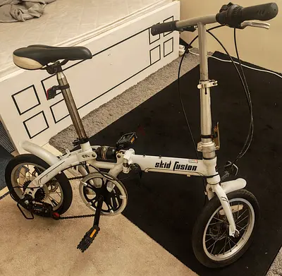 Skid Fusion folding compact bike — used and working
