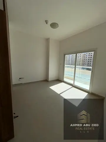 2BHK apartment for annual rent in Al Ameera Village, Ajman | Master bedroom | 3 bathrooms | Balcony with open view | Built-in wardrobes | Directly on
