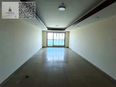 For annual rent in Ajman, Corniche Towers, a two-bedroom apartment with a living room. The bedrooms are master suites, and the apartment has a spaciou