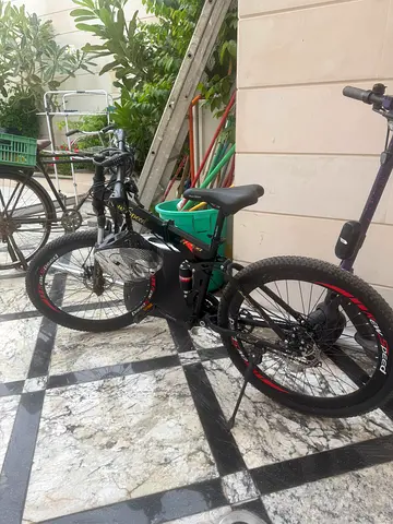 Lightly used black mountain bike - good condition