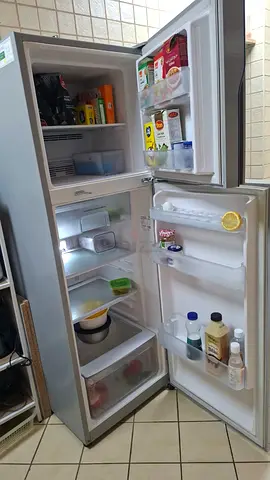 Used 2-door refrigerator (top freezer) in good working condition