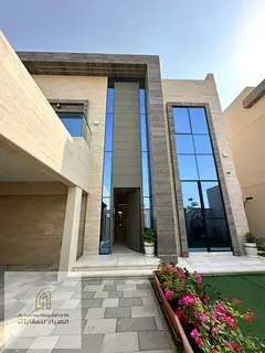 Luxury villa for sale in Sharjah, Al Tilal area, with a large area and high-end finishes, 5 master b