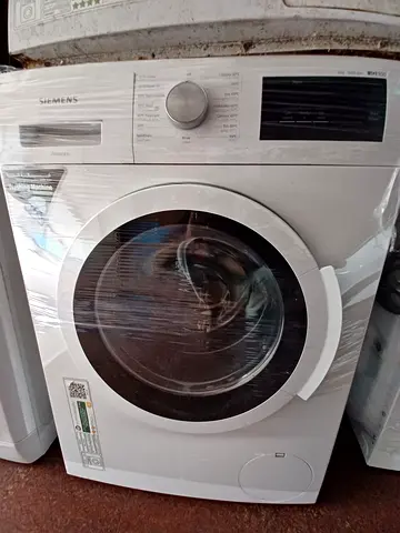 Front-load washing machine - working condition, wrapped for transport