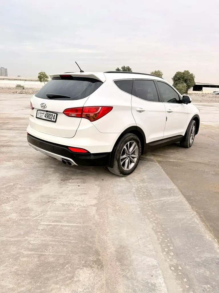 Hyundai Santa Fe 2015 — photo 1 of 9