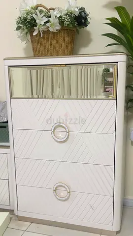 Elegant White Dresser with Mirror Front