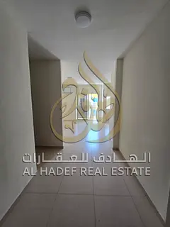 Two-bedroom apartment with a living room in Al Majaz 2 area. Free maintenance. First occupancy after