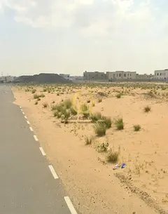 For sale: residential land in Al-Houshi area, Al-Badiyah Suburb, Sharjah Emirate. Area: 3,600 square