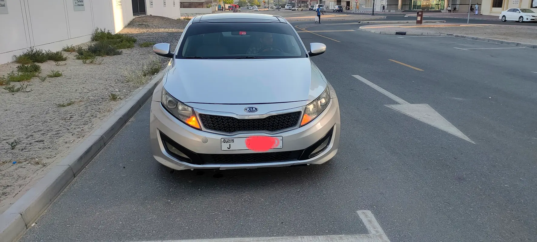 Kia Optima 2012 — photo 1 of 7