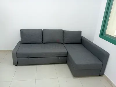 Grey L-shaped Sofa bed with Chaise - Good Condition