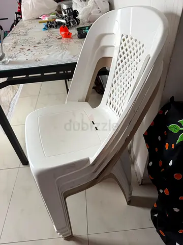 My white plastic stackable chairs - used, good condition - 4 chairs