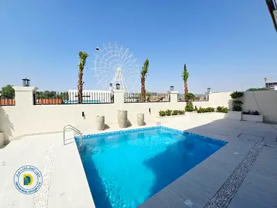 Luxury corner villa in Al Yasmin, 5 bedrooms and swimming pool, strategic location