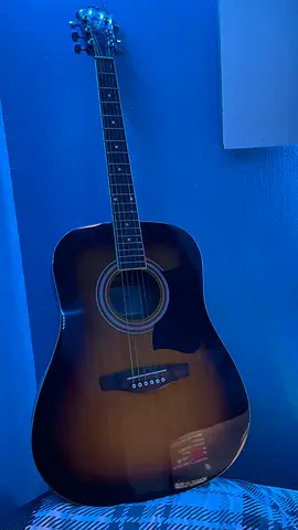 My sunburst acoustic guitar — lightly used